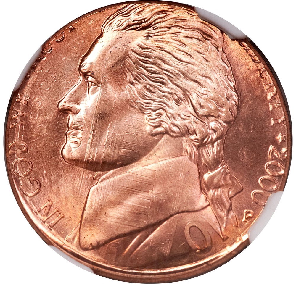 2000-P Jefferson nickel struck on a Lincoln cent planchet showing copper coloring and smaller diameter