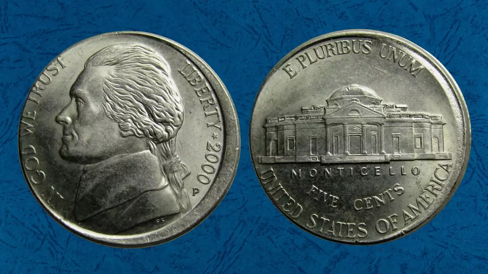 2000 Jefferson nickel with major off-center strike showing blank crescent area and visible date